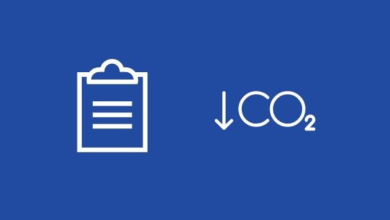 A graphic showing a clipboard and a down arrow next to CO2