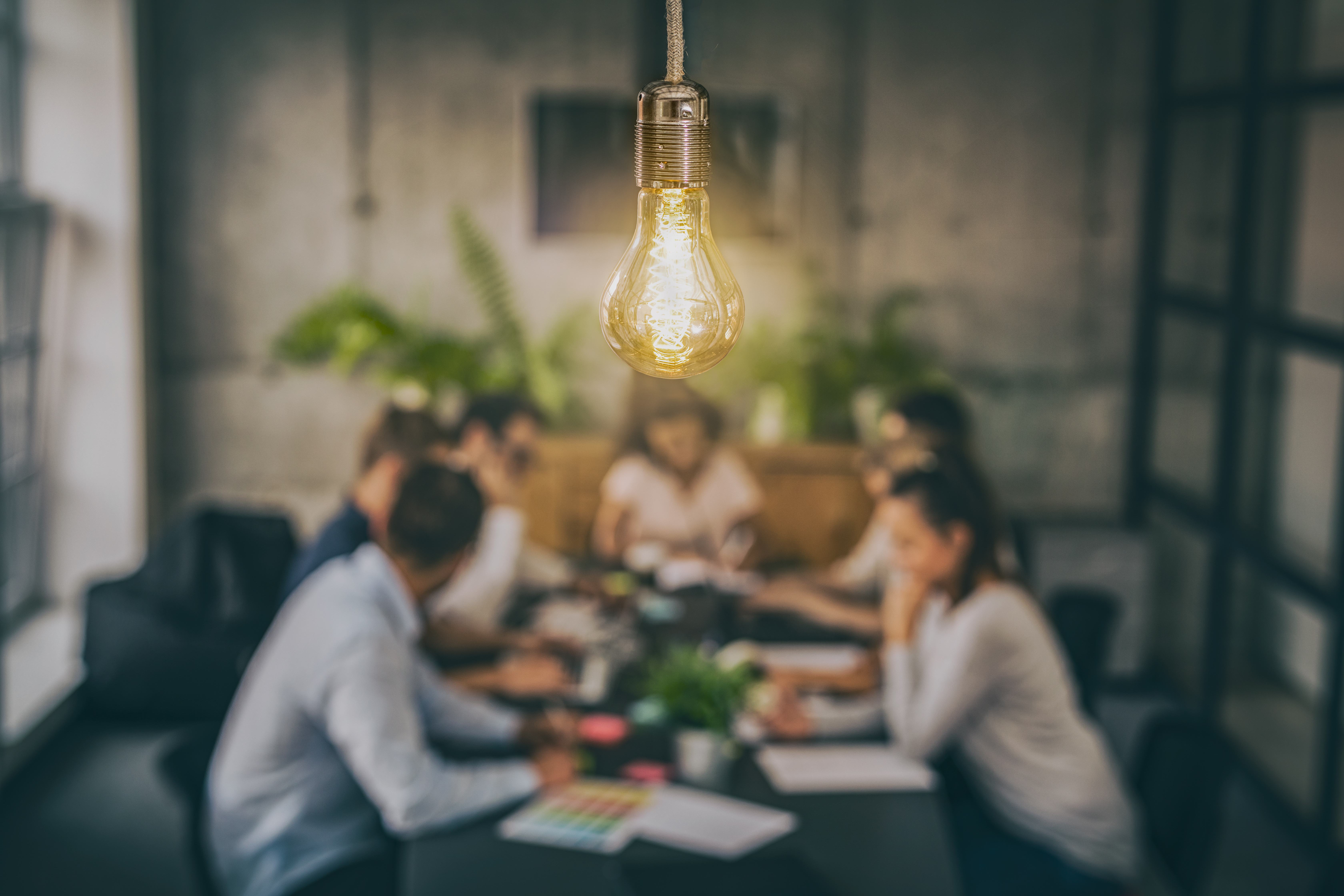  anonymized group of people having a meeting