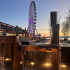 The Waterfront Fountain in its new location during the sunset. 